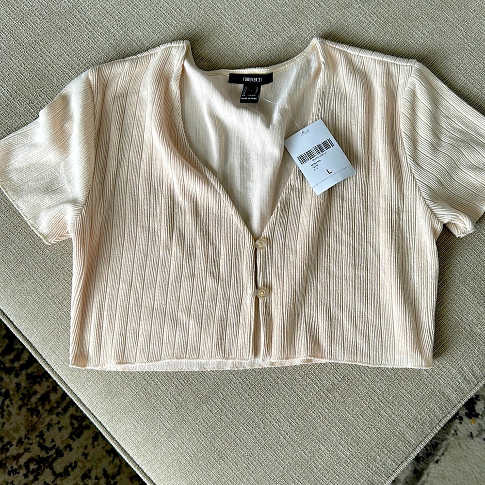 forever 21 cropped top with buttons, has a matching skirt